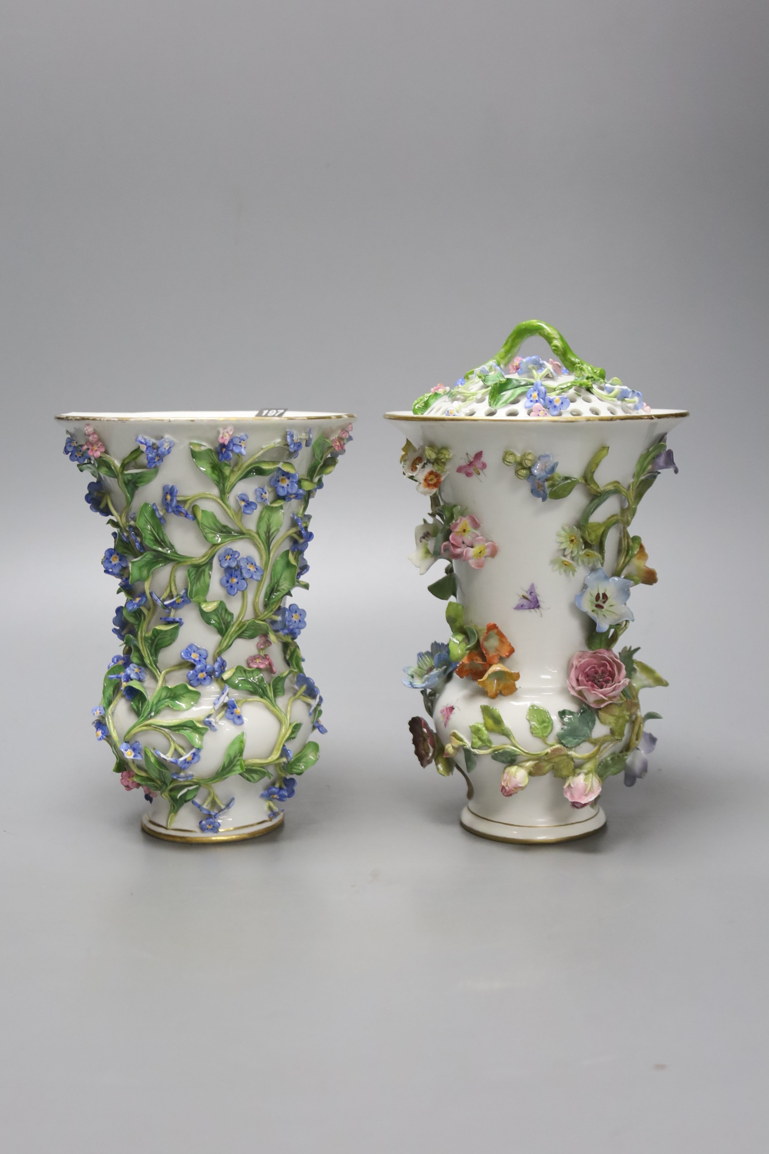 Two similar 19th century Meissen pot pourri vases and one cover, tallest 20cm